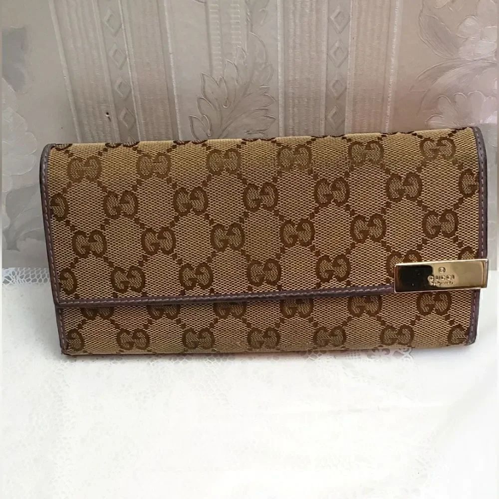 Gucci Bifold Signature Canvas Long Wallet